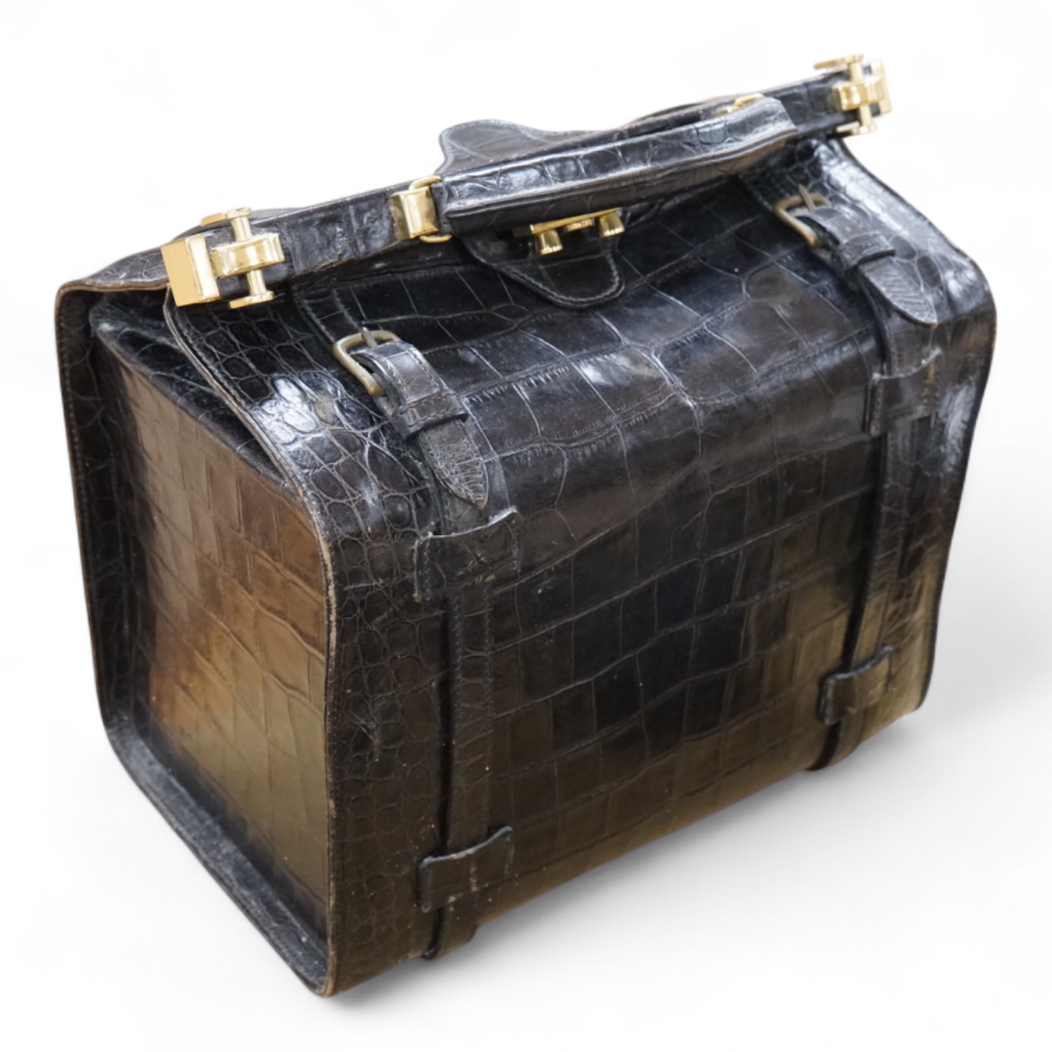 A 1940’s ladies crocodile skin Gladstone bag with gilt metal hardware, 34cm wide